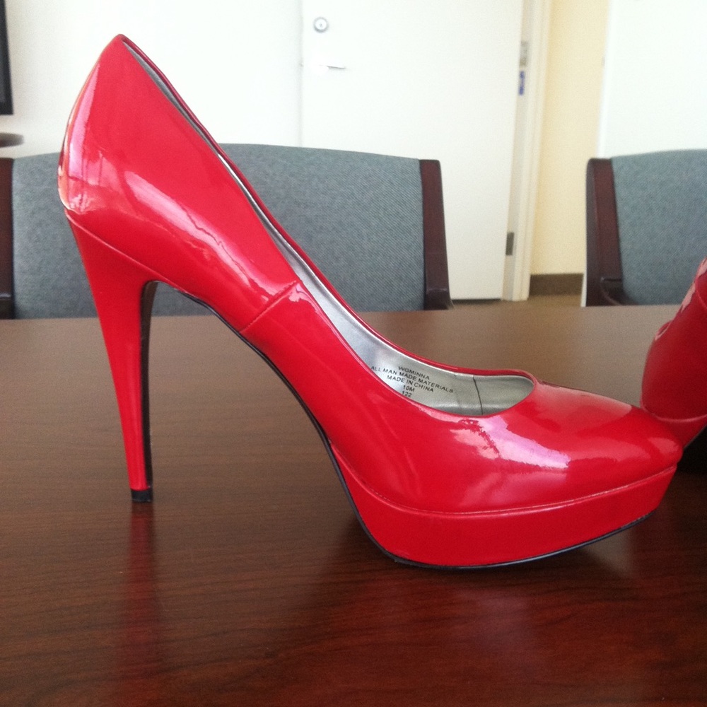 Guess Red patent leather Hortons platform shoes. Barley worn in good condition.